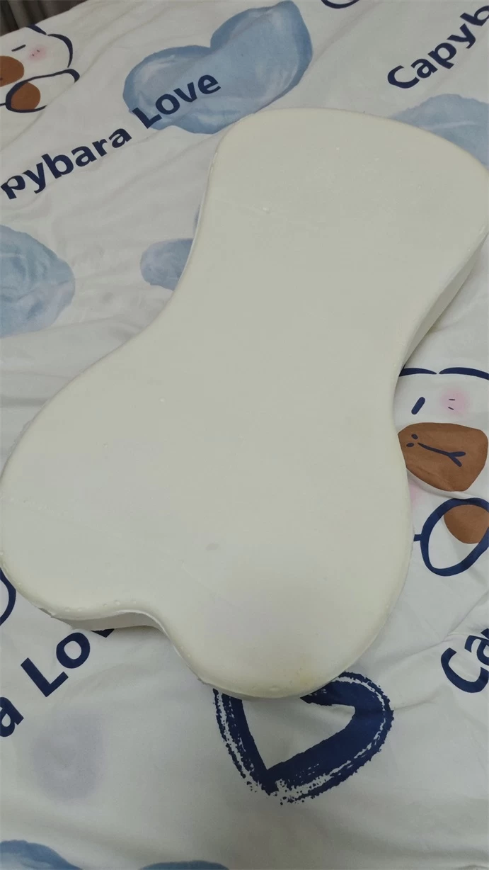 Uncovered molded latex core photographed from the back