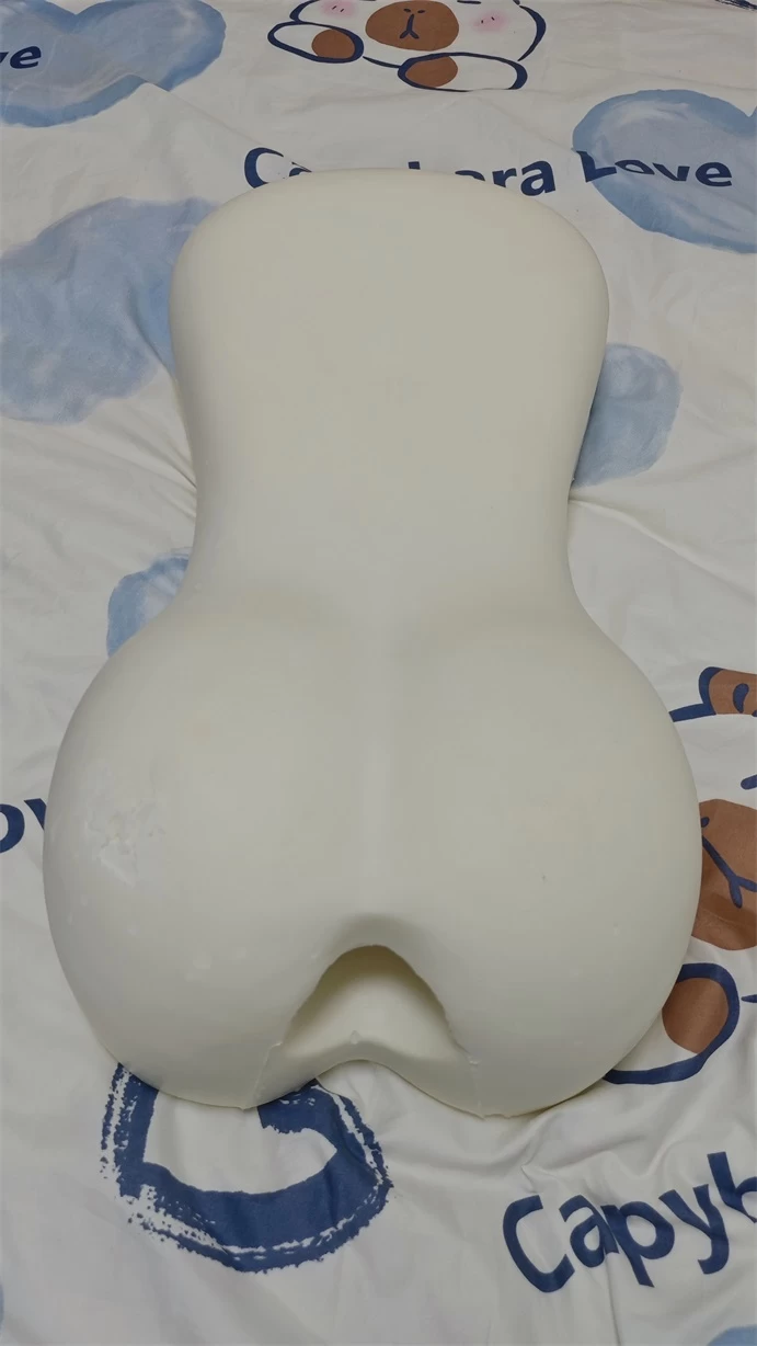 Uncovered molded latex core showing its rear contour and channel notch