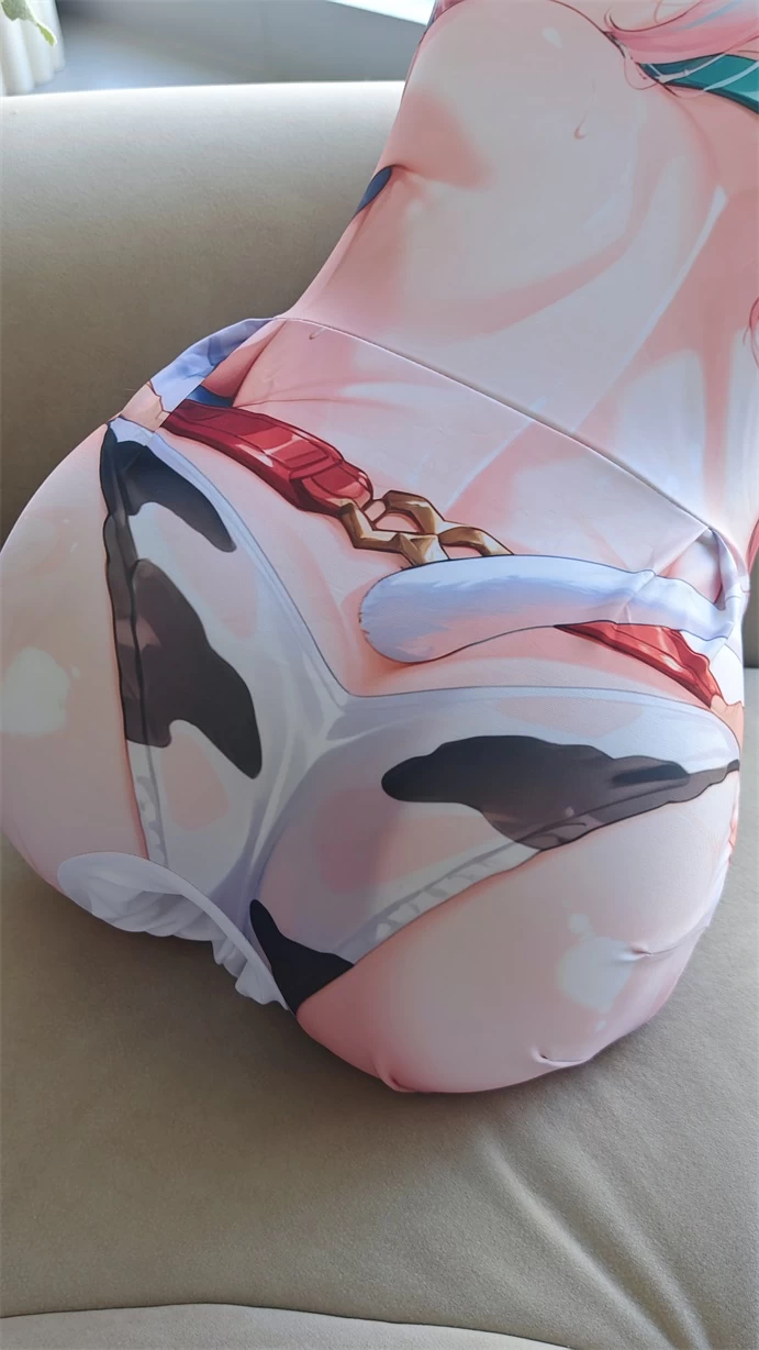 Side view highlighting the pillow contour and raised shape